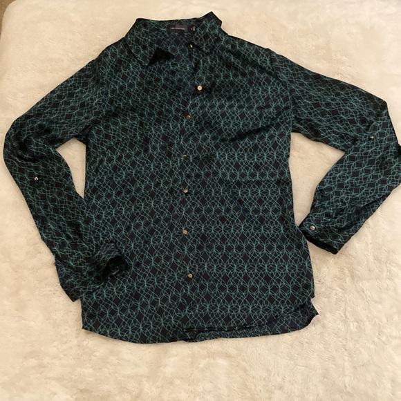 the limited, green and black button up. size S